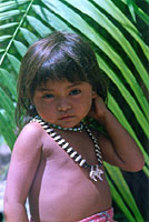 Tembé girl with deer bone and seed necklace.